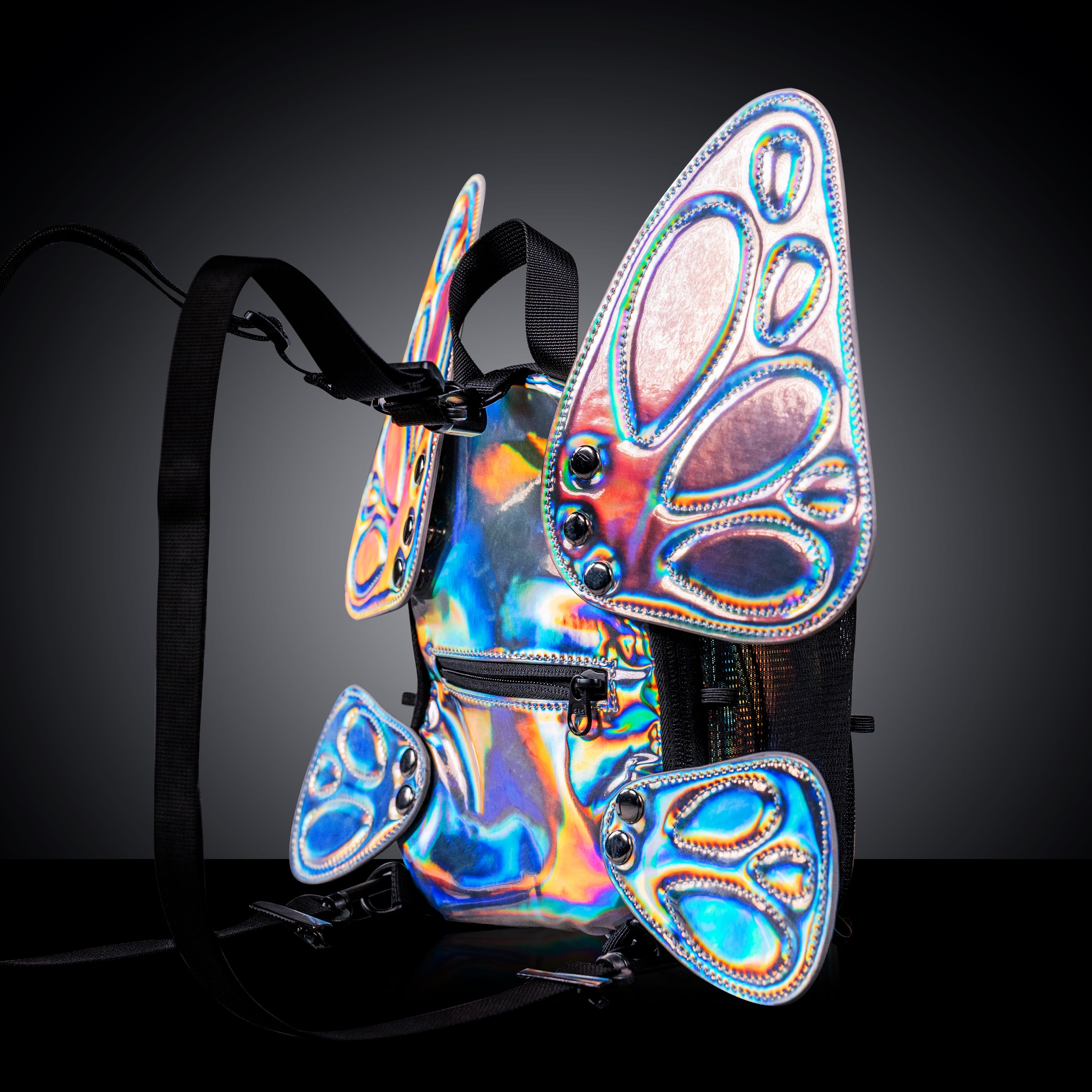 RaveBeetle FLOWt Pin Display Hydration Festival Pack โ Swappable Wing Rave Backpack with 8oz Soft Water Bottle & Light Accessory (Silver)