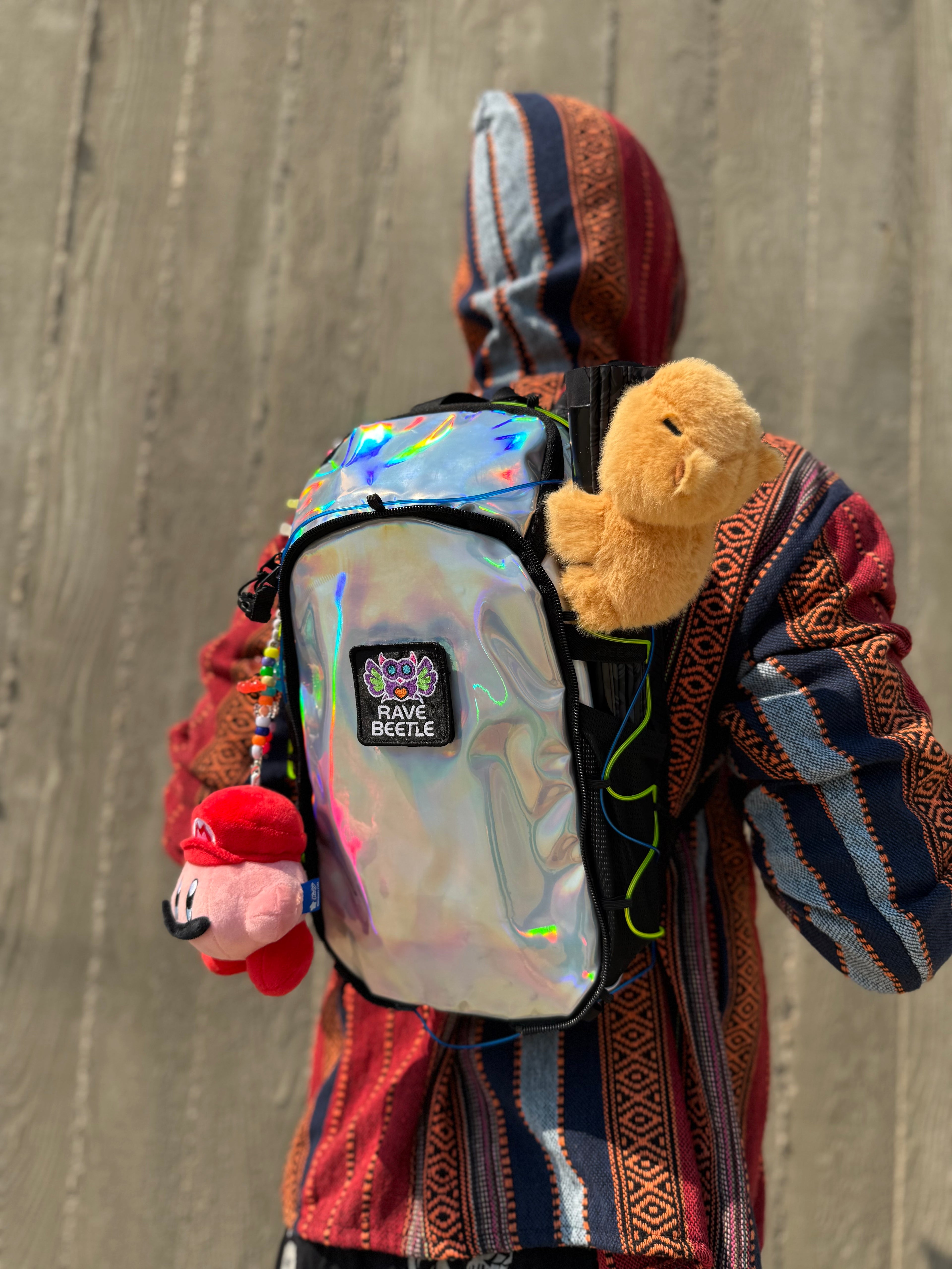 RaveBeetle Elytra Hydration Pack – Festival Backpack with Water Bladder (Holographic Silver)