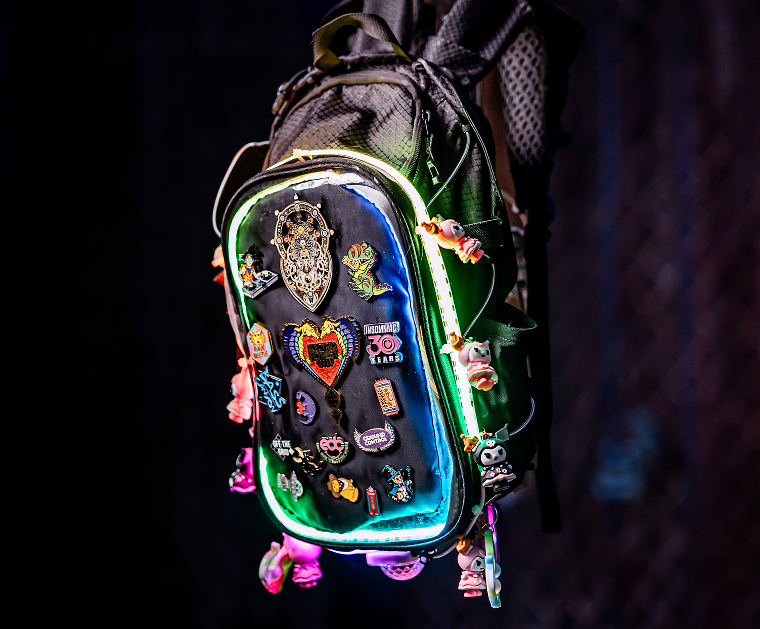 Hydration pack with customizable pin display and anti-theft design for music festivals